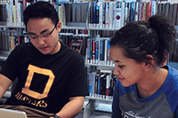 Students read books in the library